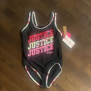 Justice Black One Piece with Pink and Yellow Accents